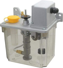 Trico - 2 L Reservoir Capacity, 3 - 6 cm Output per Cycle, 12-24 cm Output per Hour, Electric Central Lubrication System - 15 Min Interval Between Cycles, 130mm Wide x 225mm High, 110 Volts, Oil, 5/16-24 Outlet Thread - Americas Tooling