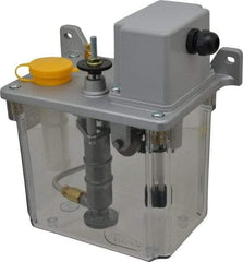 Trico - 2 L Reservoir Capacity, 3 - 6 cm Output per Cycle, 6-12 cm Output per Hour, Electric Central Lubrication System - 30 Min Interval Between Cycles, 130mm Wide x 225mm High, 110 Volts, Oil, 5/16-24 Outlet Thread - Americas Tooling