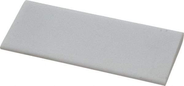 Norton - 4" Long x 1-3/4" Diam x 3/8" Thick, Novaculite Sharpening Stone - Round, Ultra Fine Grade - Americas Tooling