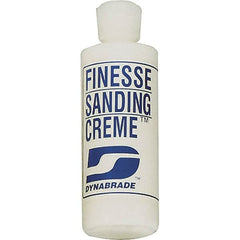 Dynabrade - 4 oz Sanding Creme Compound - Compound Grade Fine, White, For High Glossing, Use on Composites, Fiberglass & Metal - Americas Tooling