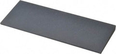 Norton - 4-1/2" Long x 1-3/4" Diam x 1/4" Thick, Silicon Carbide Sharpening Stone - Round, Fine Grade - Americas Tooling