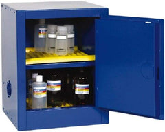 Eagle - 1 Door, 1 Shelf, Blue Steel Bench Top Safety Cabinet for Corrosive Chemicals - 23" High x 17-1/2" Wide x 18" Deep, Self Closing Door, 3 Point Key Lock, 4 Gal Capacity - Americas Tooling